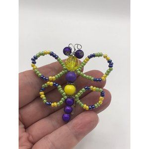 Handcrafted green, yellow, purple bead wire brooch.